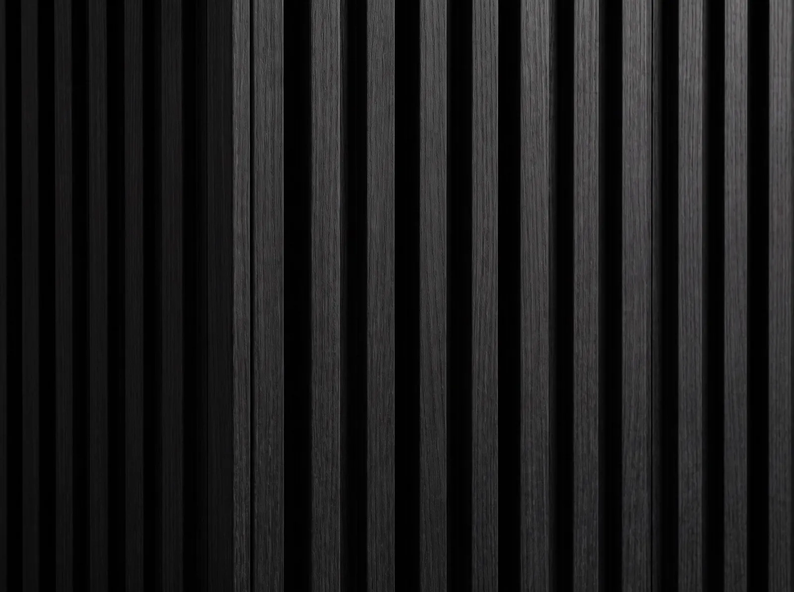 Black WPC fluted panel texture closeup